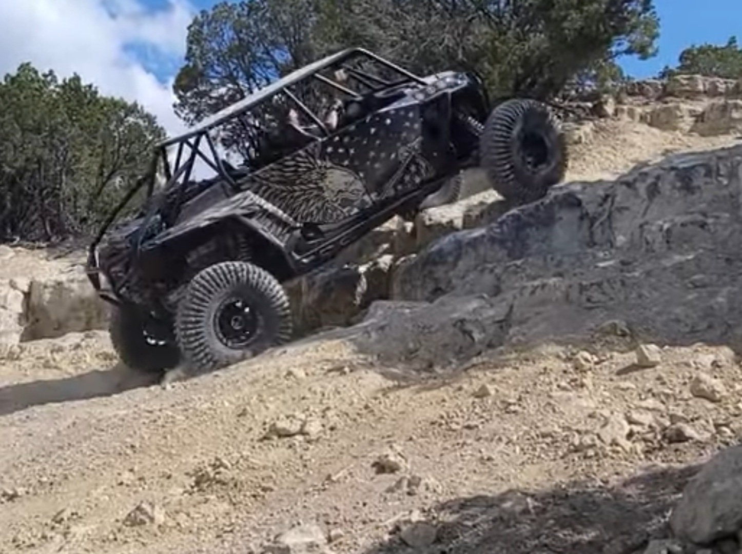 Side-by-side on rocky terrain where tire pressure affects traction and tire deflection